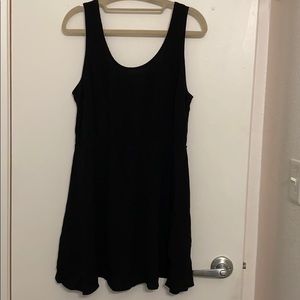 Short black dress with scoop neck